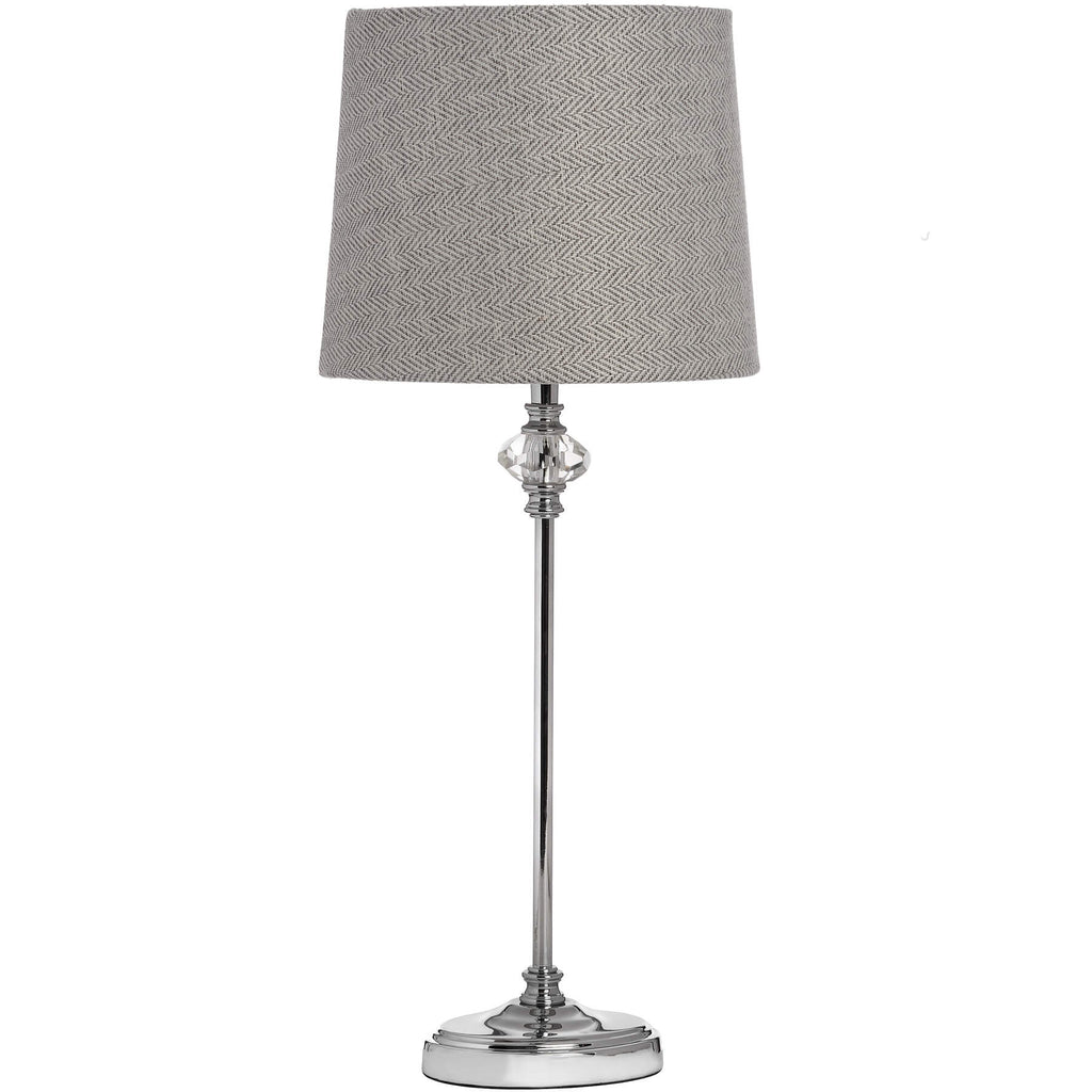 Handcrafted glass table lamp with chrome accents and grey-white herringbone shade, sophisticated silver finish. by Sostter at brixbailey.com