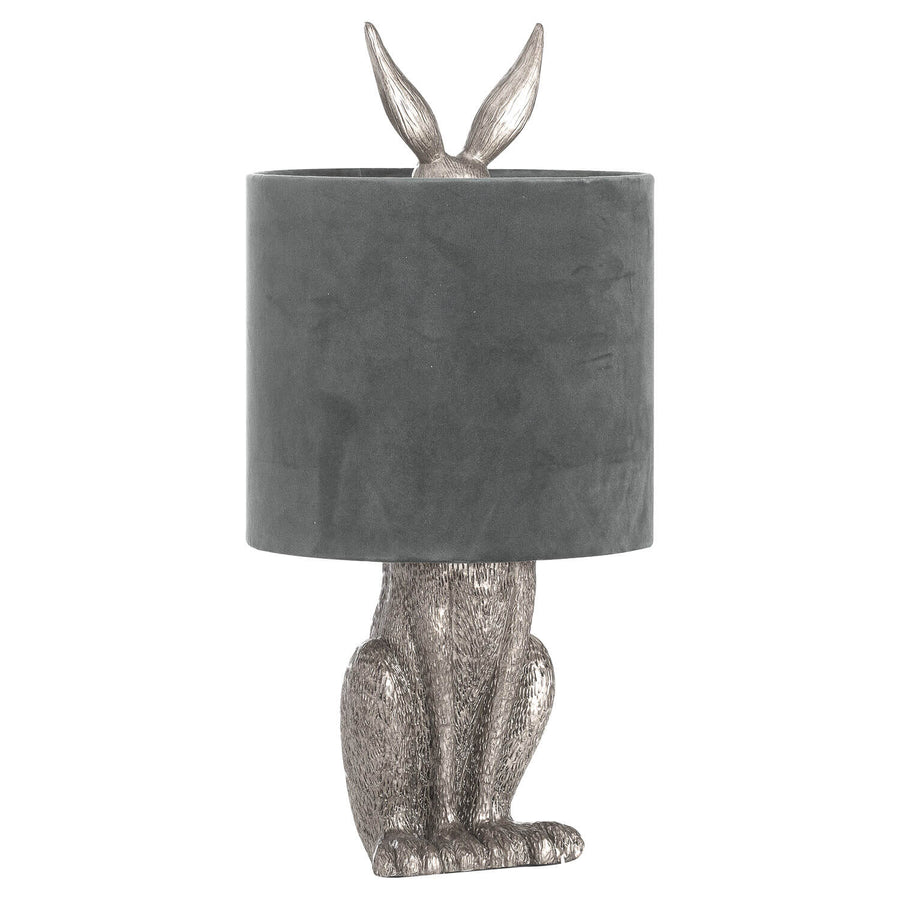 Silver Hare Table Lamp with grey velvet shade, handcrafted resin sculpture, and sophisticated silver finish. by Sostter at brixbailey.com