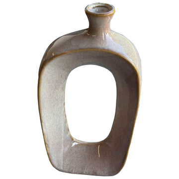 Brown ceramic Sabbia vase with organic curves and hollow design, 34 cm tall, for floral arrangements or standalone decor by Sostter at brixbailey.com