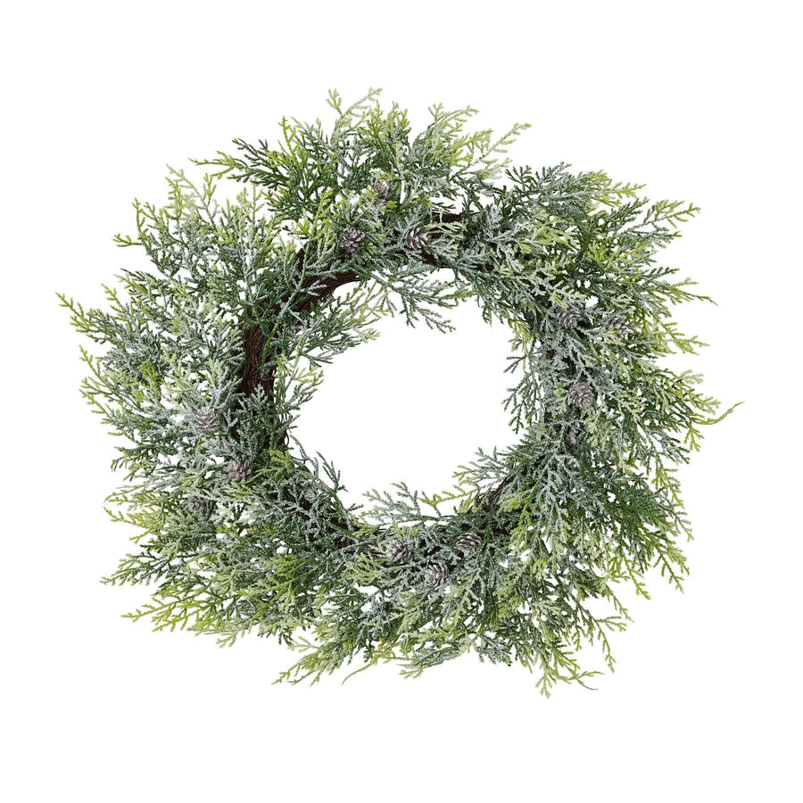Frosted pine wreath with lifelike winter frost effect, pinecones, and elegant white-green accents, 55cm diameter. by Sostter at brixbailey.com