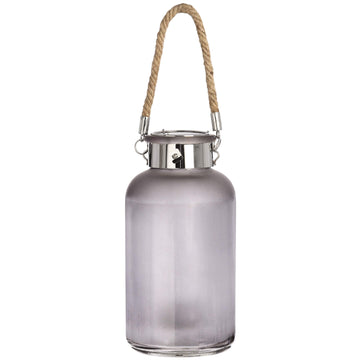 Frosted grey glass lantern with star-like LED glow, natural rope handle, modern rustic design for indoor or outdoor ambiance. by Sostter at brixbailey.com
