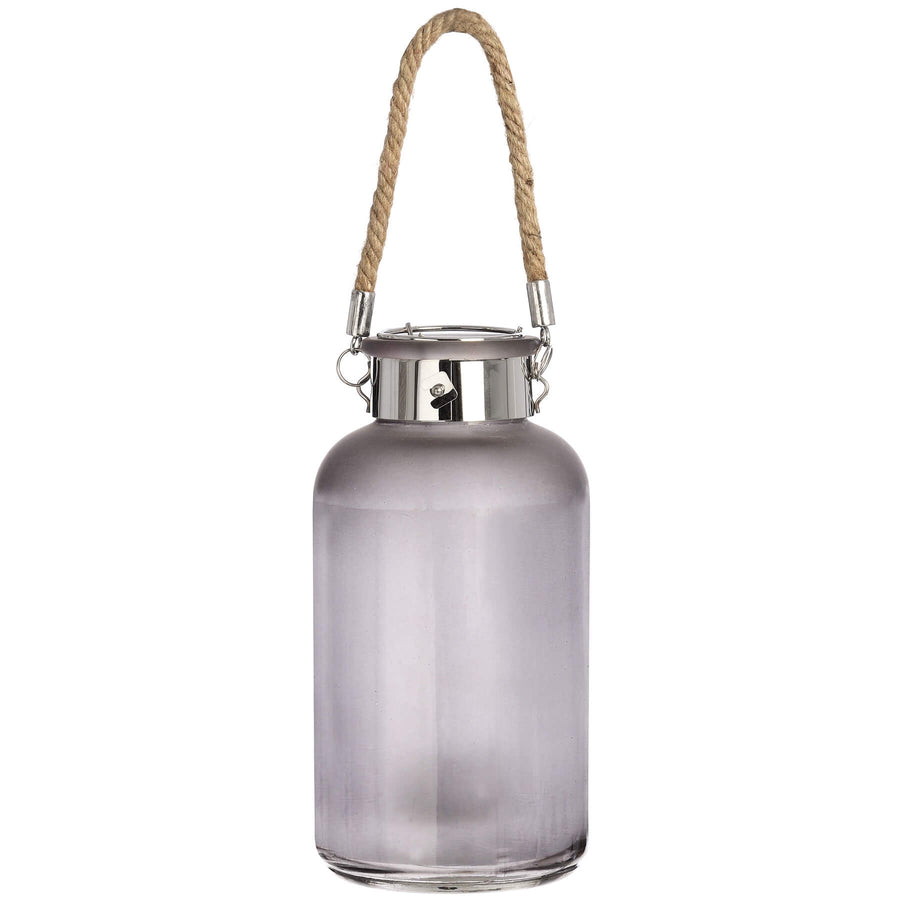 Frosted grey glass lantern with star-like LED glow, natural rope handle, modern rustic design for indoor or outdoor ambiance. by Sostter at brixbailey.com