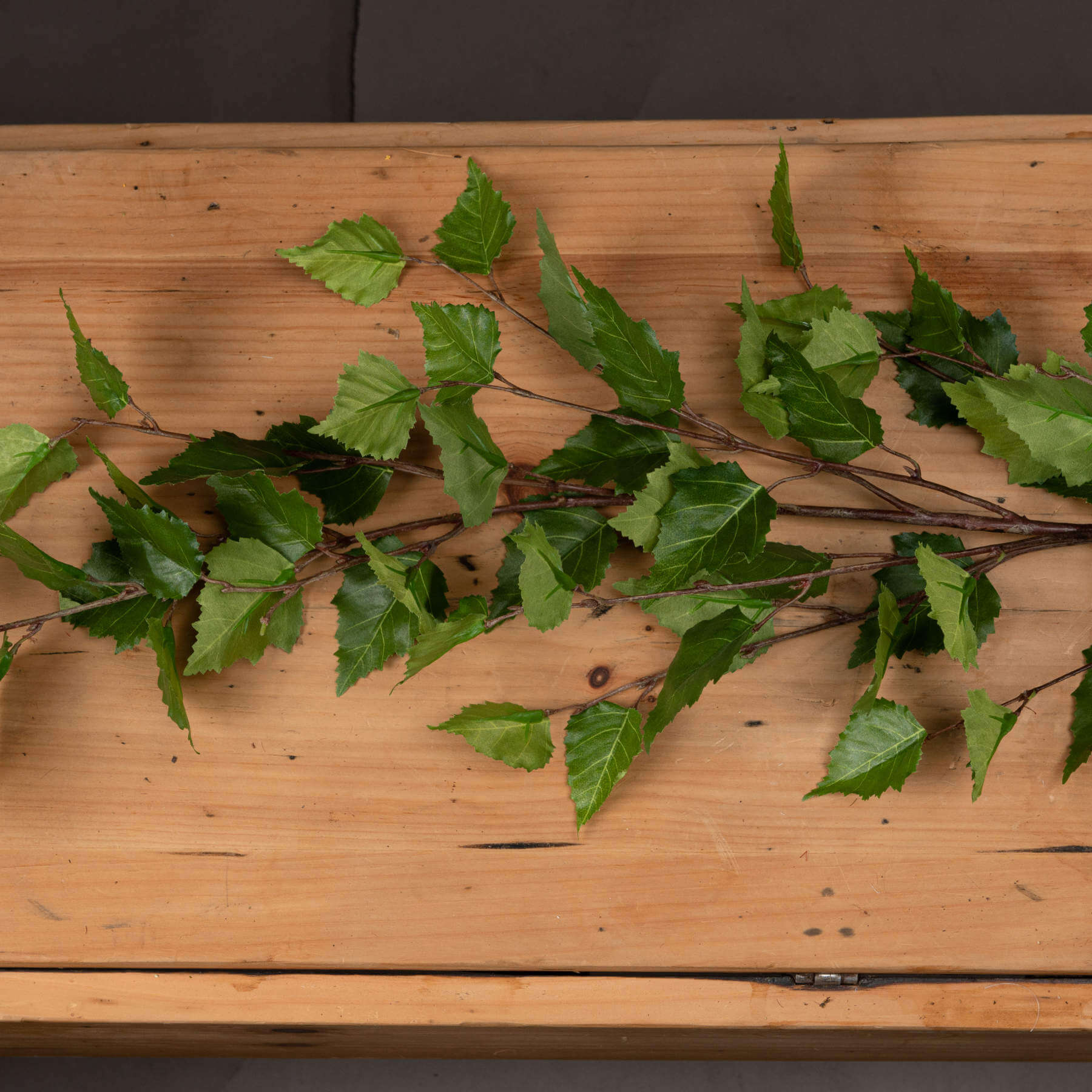 Lifelike green branch spray with lush foliage, 128 cm tall, perfect for seasonal home decor arrangements by RoomLondon at brixbailey.com