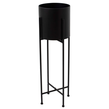 Modern matte black metal planter with geometric base, 84cm tall, for stylish indoor plant display by Sostter at brixbailey.com