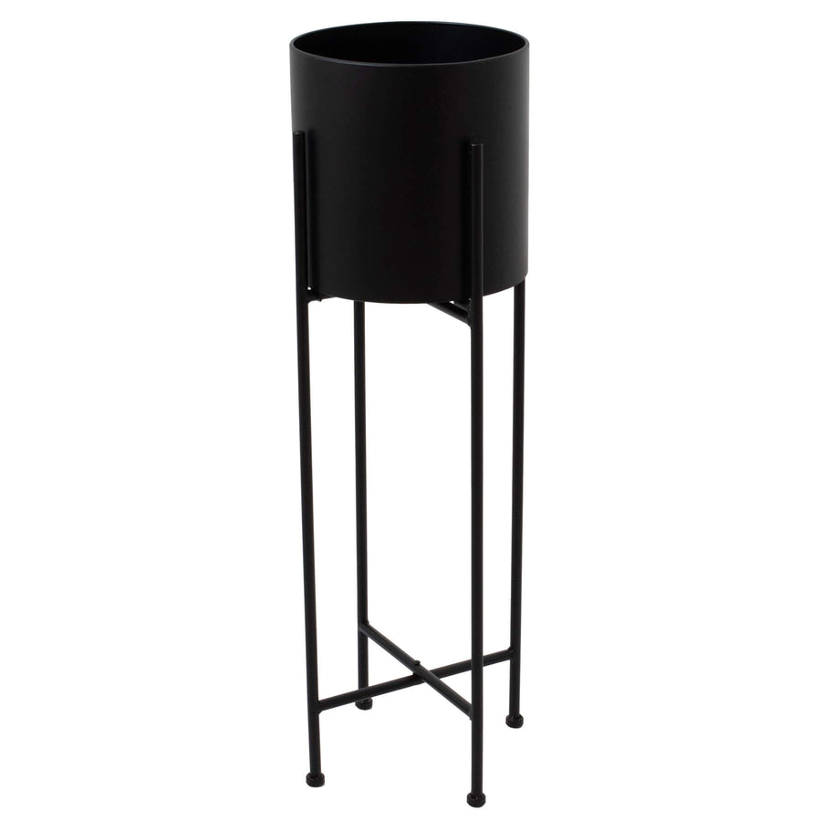 Modern matte black metal planter with geometric base, 84cm tall, for stylish indoor plant display by Sostter at brixbailey.com