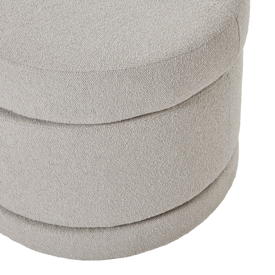 Plush Aspen swivel ottoman in neutral tone with hidden storage and 360-degree rotation on metal base by Sostter at brixbailey.com