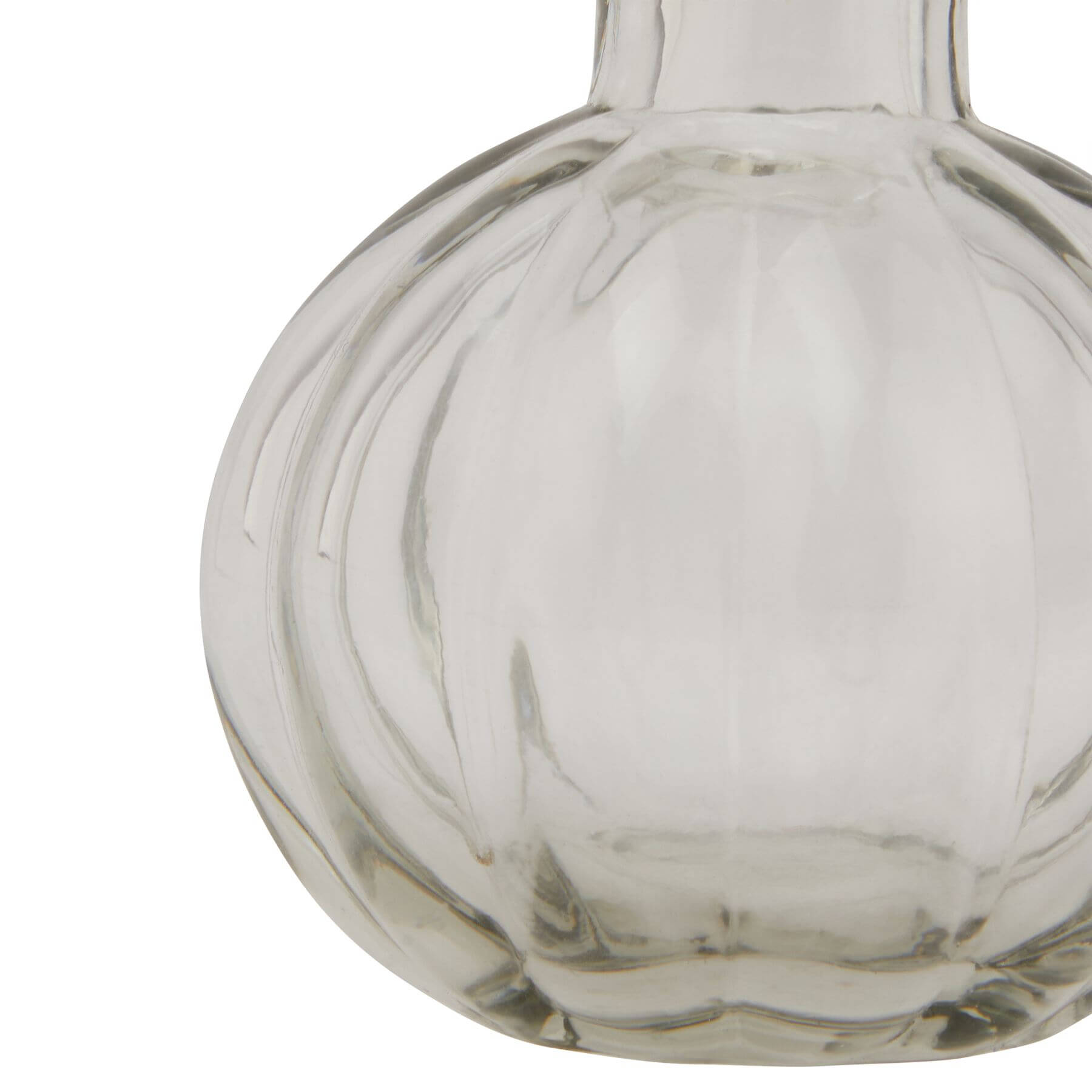Clear glass minimalist bud vase, contemporary Mediterranean design, perfect for fresh or dried floral arrangements by Sostter at brixbailey.com
