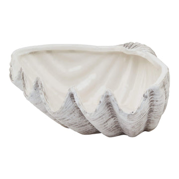 Handcrafted white ceramic shell bowl with organic spiral design and matte finish, perfect for coastal-inspired decor. by Sostter at brixbailey.com