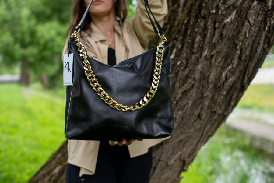 Classic Black Handbag – Elegant & Versatile Leather Style by Zelma Kraft at brixbailey.com