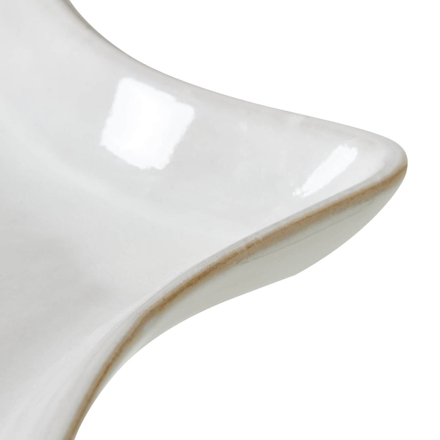 Minimalist white ceramic star dish for home dÃ©cor, handcrafted with smooth edges and luminous finish. by Sostter at brixbailey.com