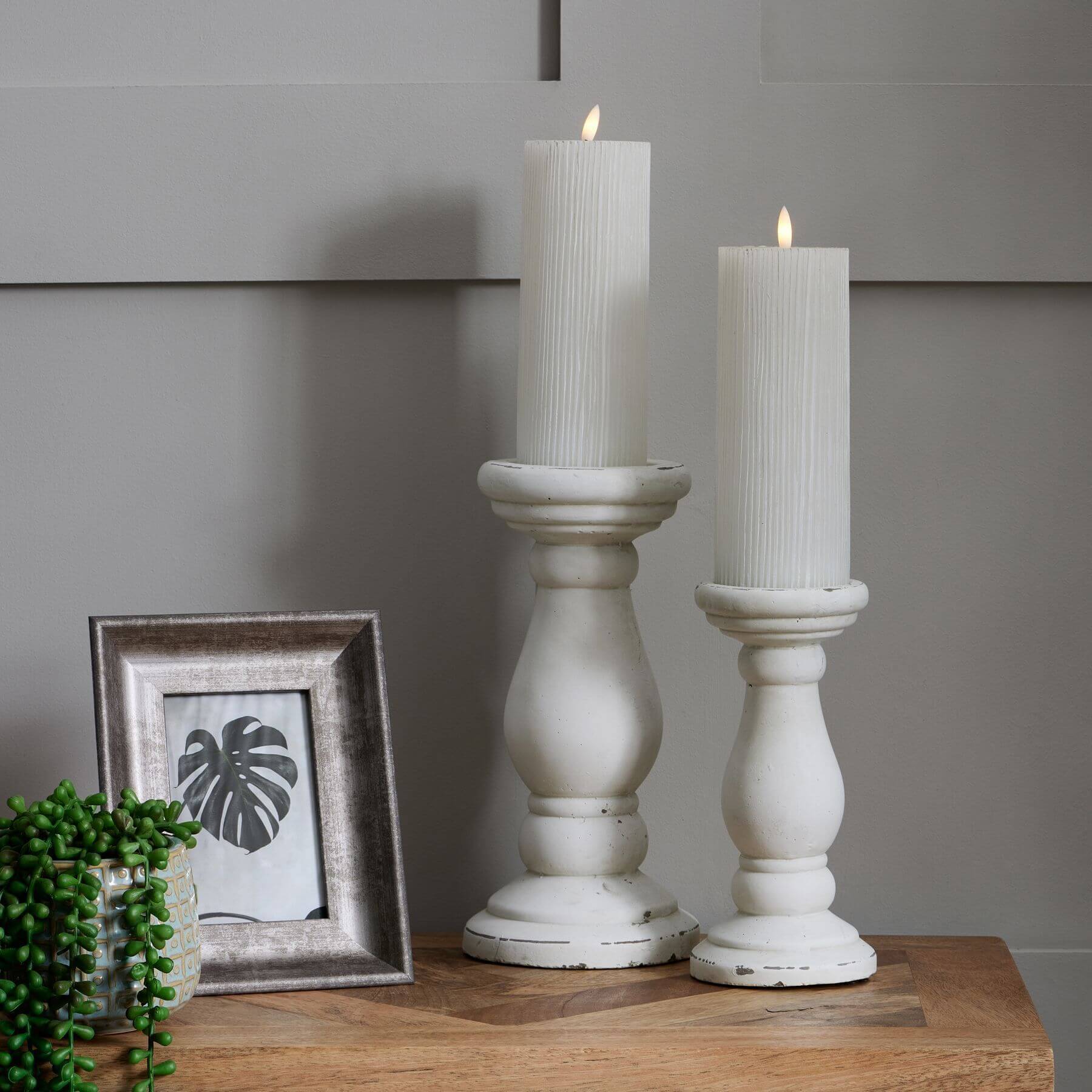 Minimalist white ceramic candle holder with clean lines and matte finish for modern decor by RoomLondon at brixbailey.com