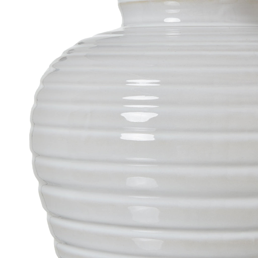 Handcrafted ribbed ceramic table lamp in earthy green with neutral linen shade, 62cm tall, for ambient lighting. by Sostter at brixbailey.com