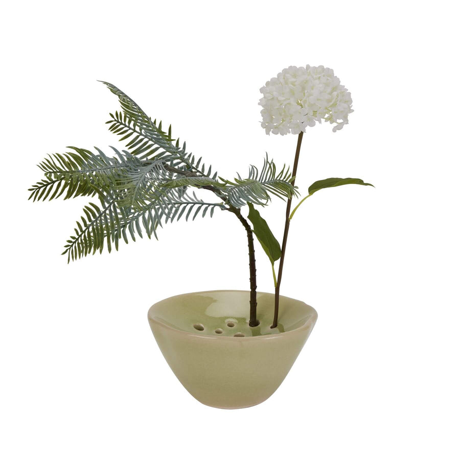 Light green ceramic flower frog with matte finish, 15cm wide, for professional floral arrangements by Sostter at brixbailey.com