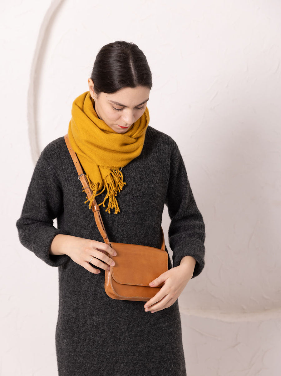 Charming Handmade Leather Purse – Perfect for Essentials by TOKS VISOKS at www.brixbailey.com