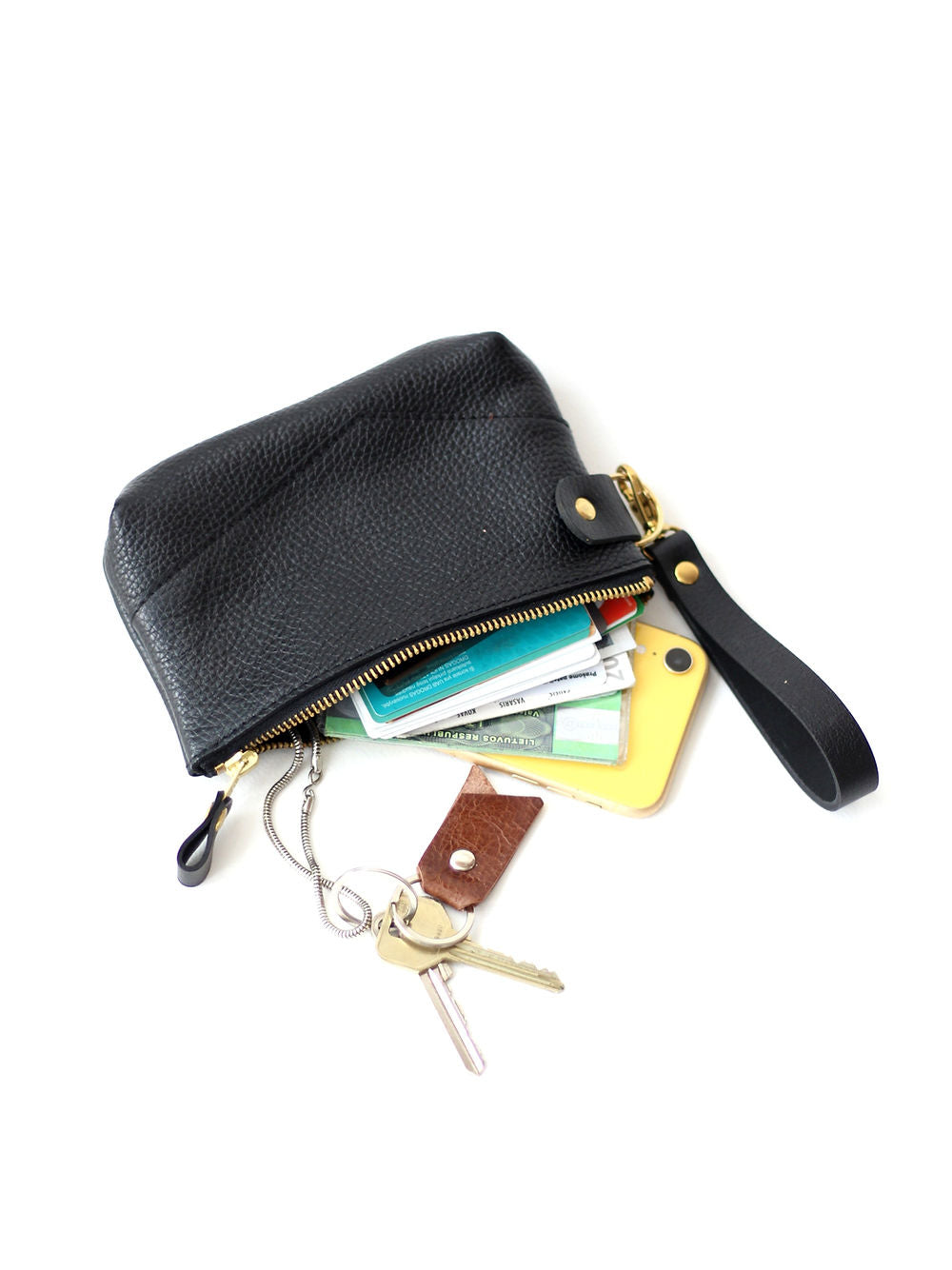 Versatile Hand-made Leather Pouch with Wrist Strap – Multi-Purpose by TOKS VISOKS at www.brixbailey.com