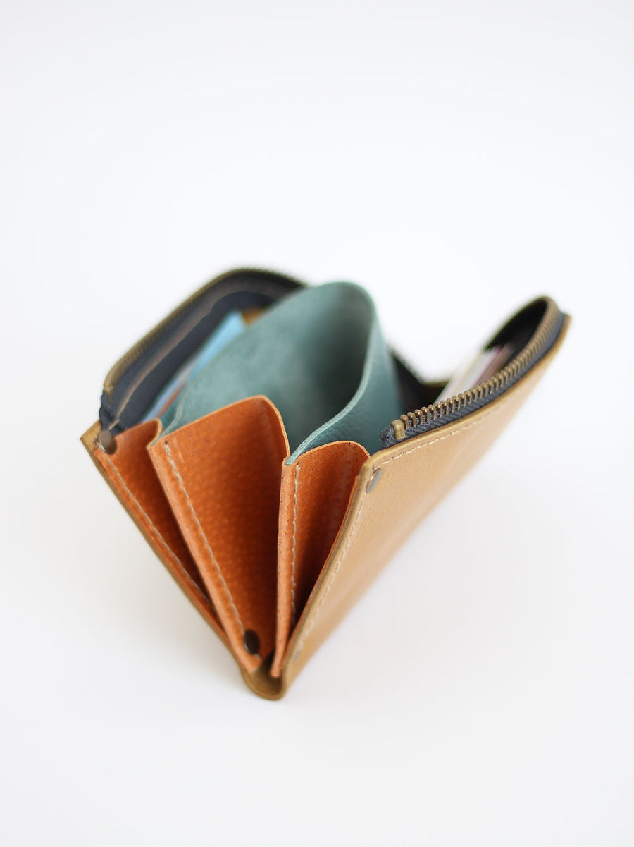 Compact WEDNESDAY Leather Wallet – Spacious & Curved Zip by TOKS VISOKS at www.brixbailey.com