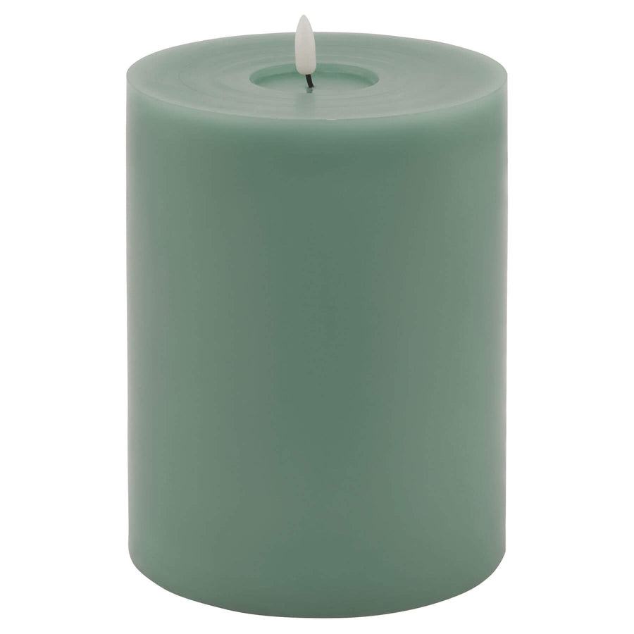 Sage LED wax candle with realistic melt effect, warm glow, modern decor accent, flame-free ambiance  by Sostter at brixbailey.com