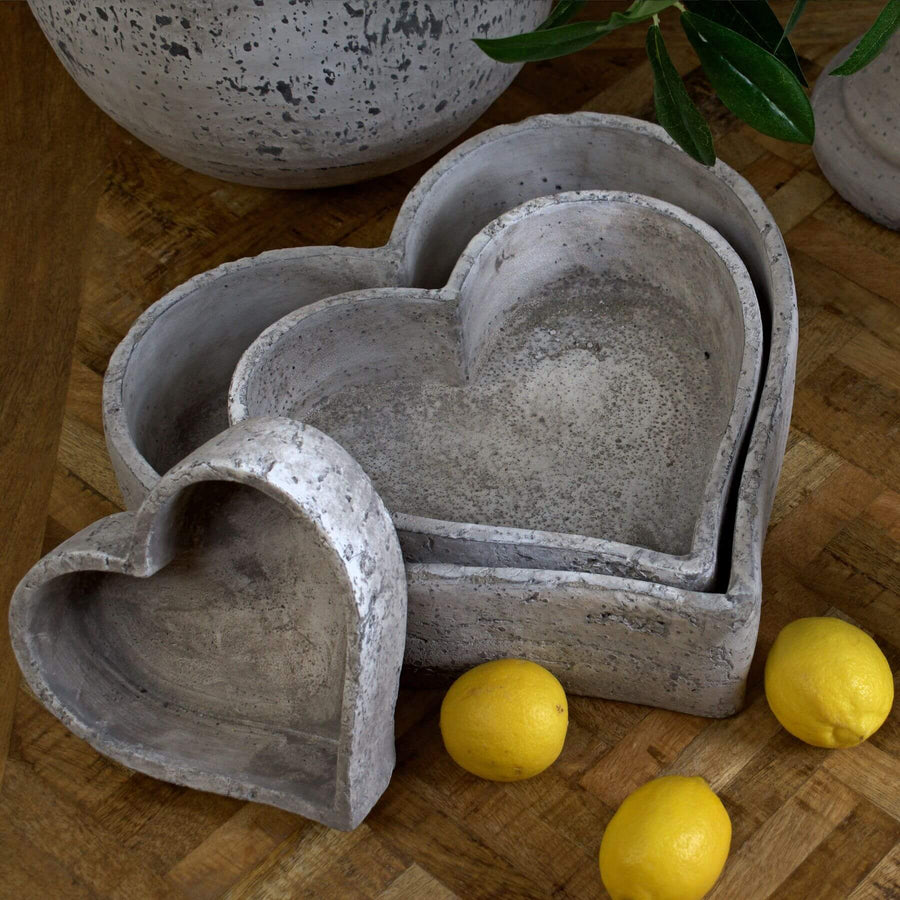 Handcrafted ceramic dish trio in natural stone, minimalist design with organic texture for home decor display. by Sostter at brixbailey.com