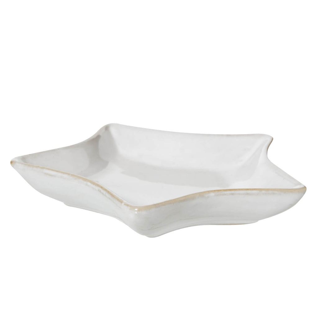 White ceramic star dish with clean lines, minimalist design, and smooth glaze finish for home dÃ©cor by RoomLondon at brixbailey.com