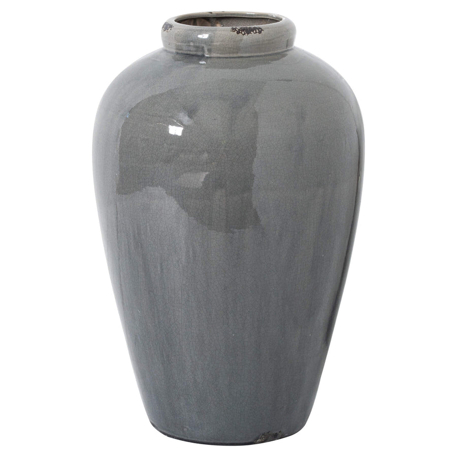 Tall grey ceramic vase with glazed finish, textured surface, and minimalist design for modern home decor. by Sostter at brixbailey.com