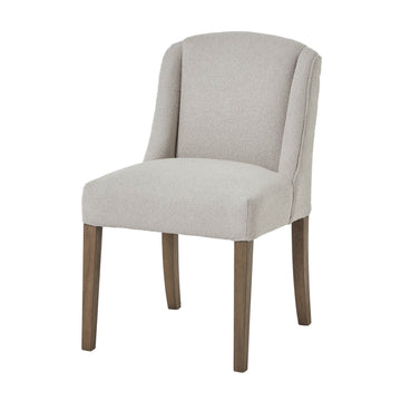 Compton Aspen Dining Chair with curved backrest, twill upholstery, and rustic wood frame for elegant dining spaces by Sostter at brixbailey.com