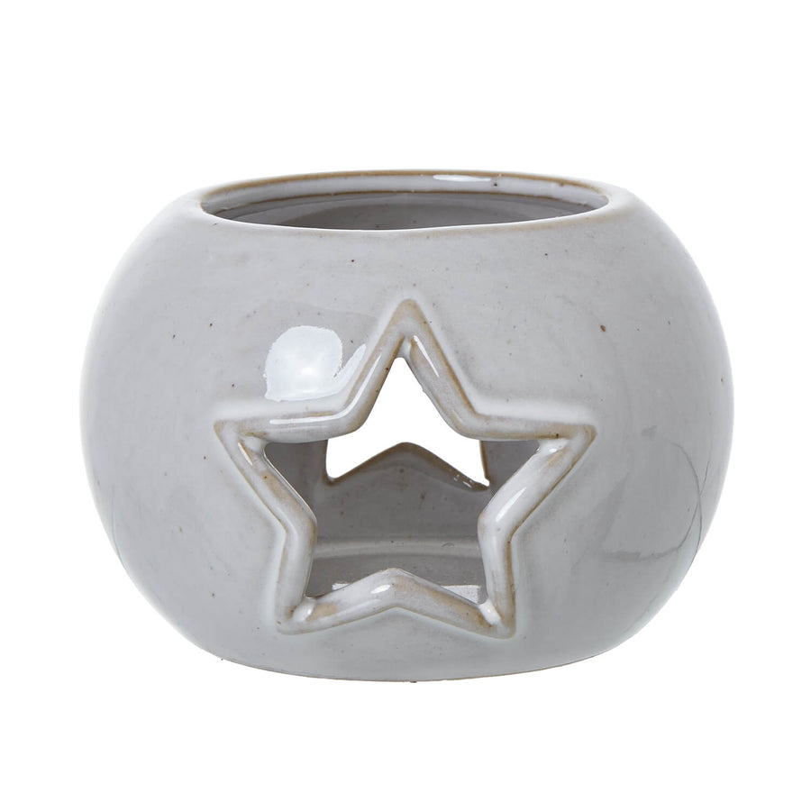 White ceramic tealight holder with star cutouts, projects constellations when lit, minimalist home decor  

**  
- **Keywords included:** ceramic tealight holder, star cutouts, constellations, minimalist home decor  
- **Clear description:** Visually conveys the productâ€™s design and function  
- **SEO & accessibility optimized:** Concise, descriptive, and keyword-rich for both search engines and screen readers by Sostter at brixbailey.com