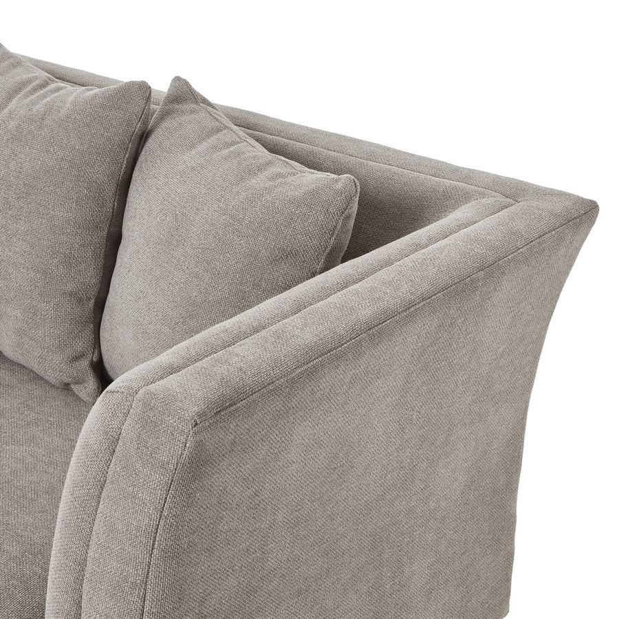 Vesper Taupe three-seater sofa with plush cushions, solid wood frame, and clean-lined silhouette in neutral hue by Sostter at brixbailey.com