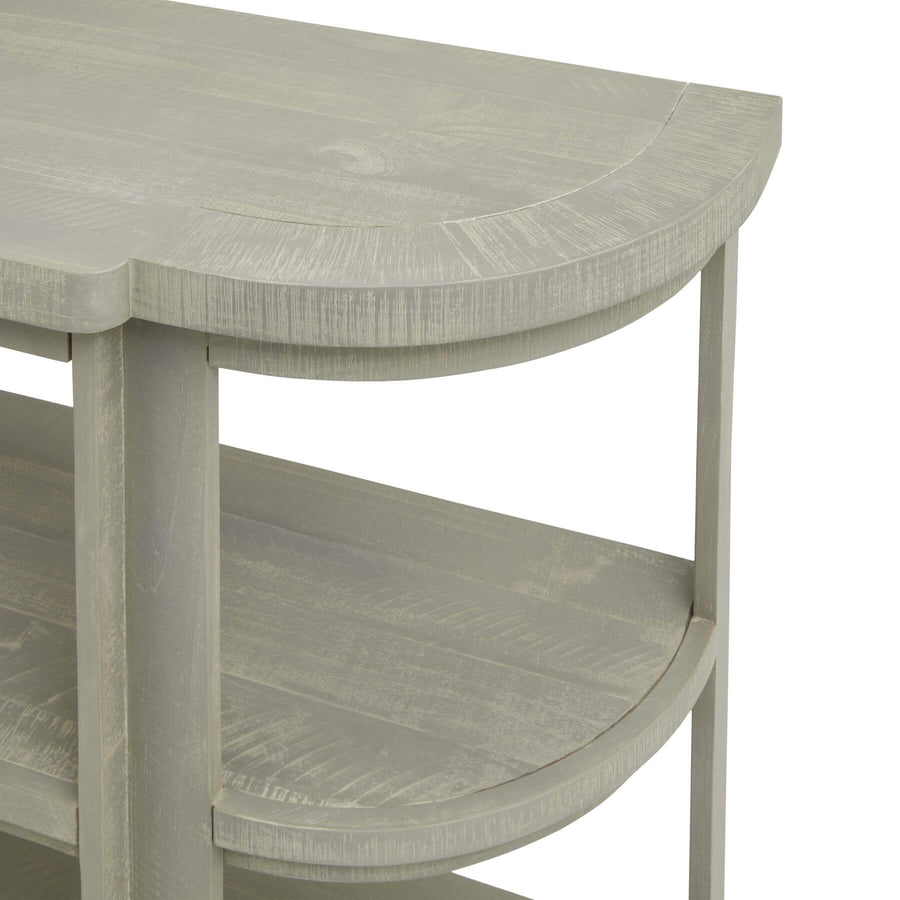 Grey-washed pine console table with curved silhouette and organic wood grain, artisan-crafted for modern or rustic dÃ©cor. by Sostter at brixbailey.com