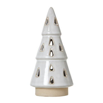 Handcrafted white ceramic LED tree with intricate cut-out patterns, casting warm glowing shadows for minimalist decor. by Sostter at brixbailey.com