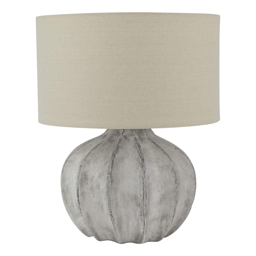 Handcrafted concrete table lamp with ribbed base and beige fabric shade, natural stone gray, farmhouse-industrial decor. by Sostter at brixbailey.com