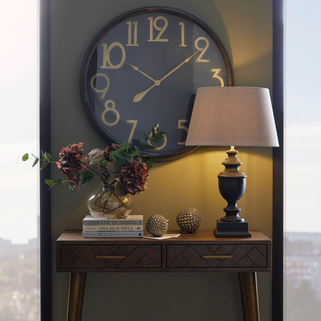 Retro-modern brass numeral wall clock with black face, 80cm diameter, vintage-inspired statement piece for home decor by Sostter at brixbailey.com