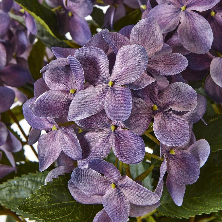 Medium purple faux hydrangea plant in pot, lifelike lavender blooms, perfect for home decor by Sostter at brixbailey.com