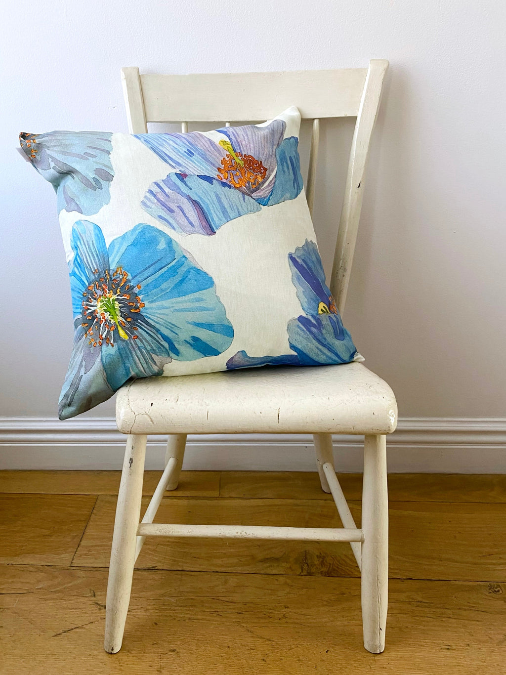 Himalayan Blue Poppies Throw Pillow in Ecru