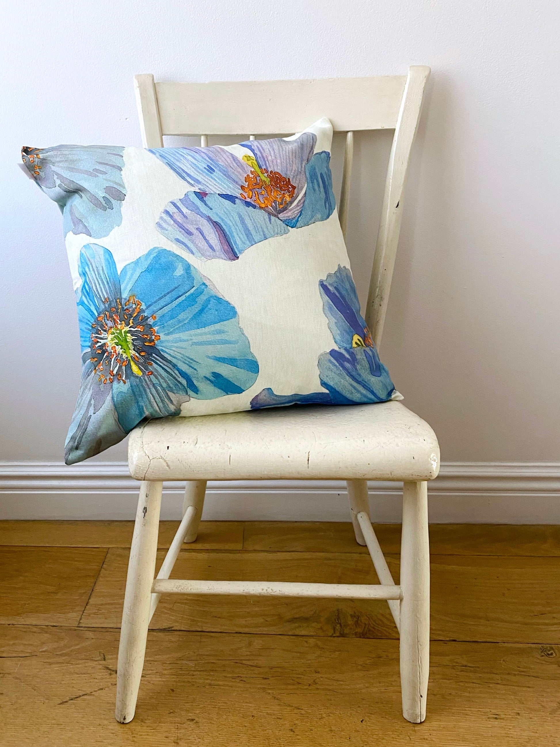 Himalayan Blue Poppies Throw Pillow in Ecru