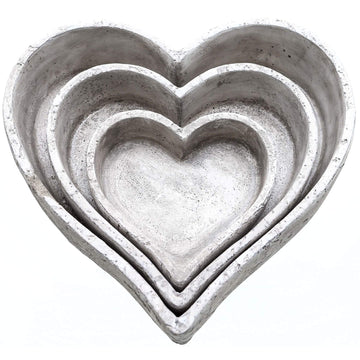 Handcrafted ceramic dish trio in natural stone, minimalist design with organic texture for home decor display. by Sostter at brixbailey.com