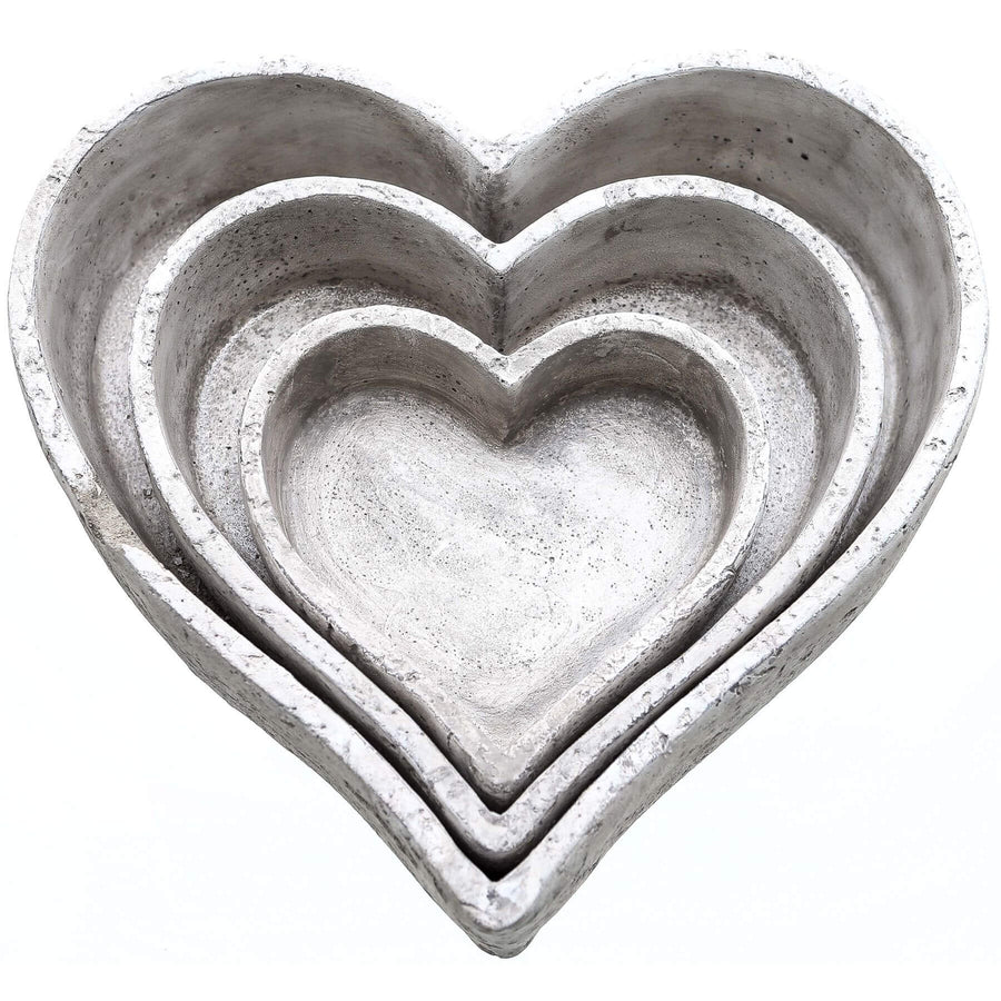 Handcrafted ceramic dish trio in natural stone, minimalist design with organic texture for home decor display. by Sostter at brixbailey.com