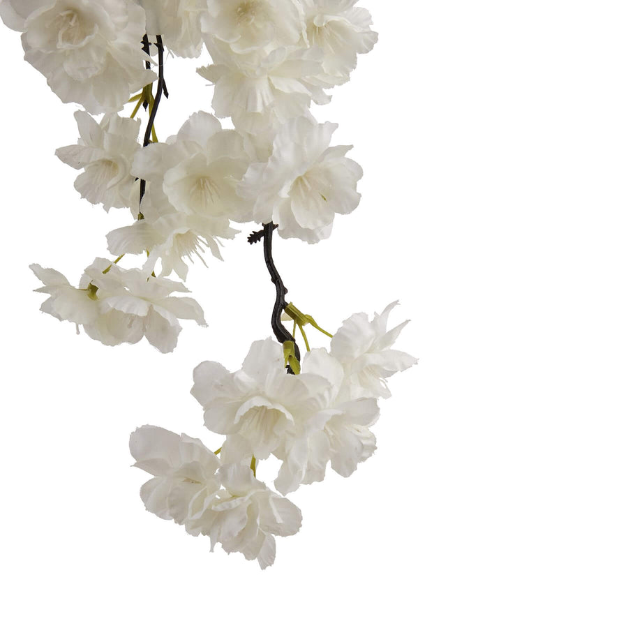 White cherry blossom stems with hyper-realistic petals, arched design, and pure white color for everlasting floral decor. by Sostter at brixbailey.com