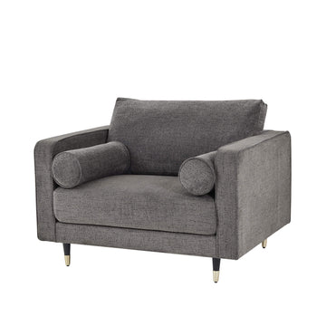 Grey fabric armchair with plush cushioning, curved arms, and neutral tone for modern or traditional interiors by Sostter at brixbailey.com