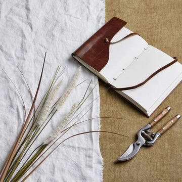 Lifelike artificial grass stems in soft cream, triple-stem design for natural volume, 80cm height, perfect for home decor by Sostter at brixbailey.com