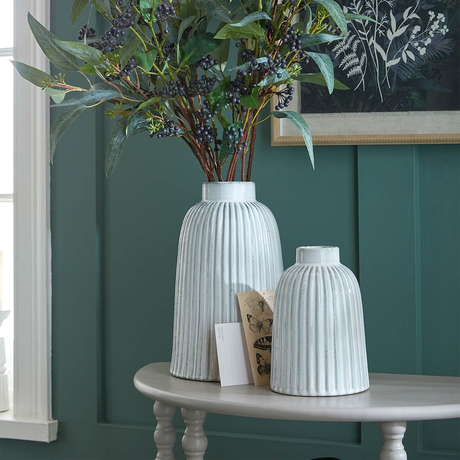 Hand-blown Monte vase in pure white ceramic, minimalist bell shape with crystal-clear glaze for modern decor. by Sostter at brixbailey.com