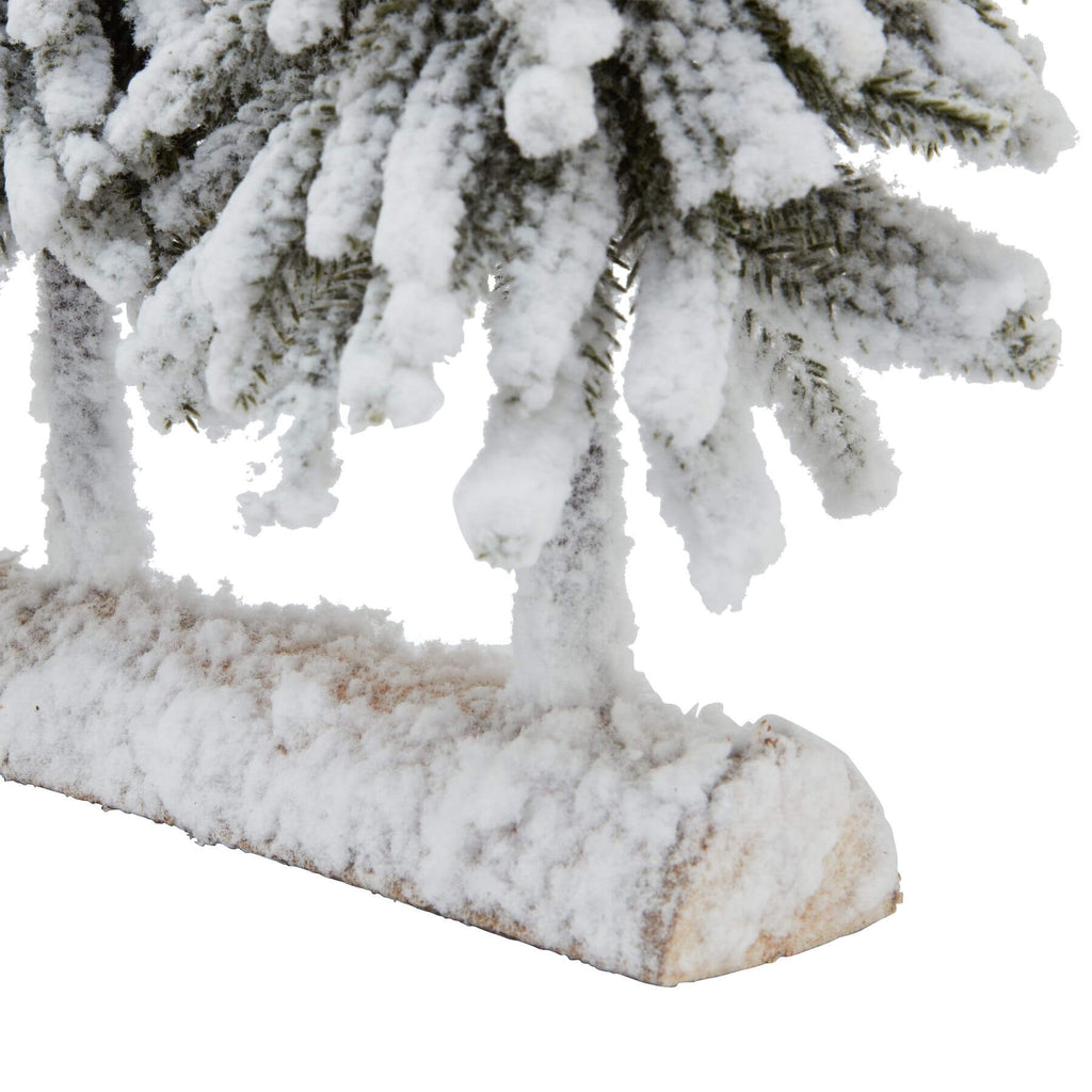 Snow-dusted fir tree duo on rustic wooden base, perfect for winter decor and holiday centerpieces. by Sostter at brixbailey.com