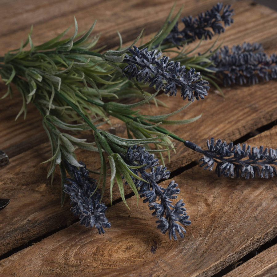 Realistic faux lavender stems with purple blooms and green accents, perfect for year-round home decor  by Sostter at brixbailey.com