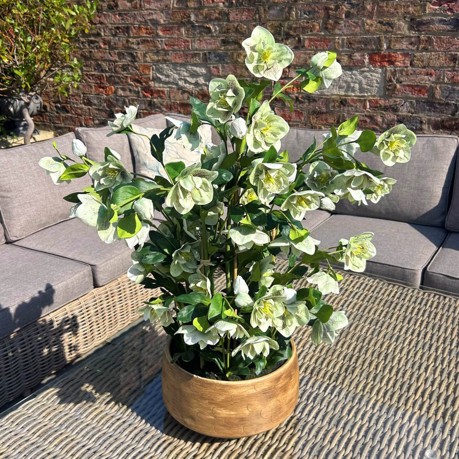 Lifelike white faux orchid in ceramic pot, ultra-realistic phalaenopsis blooms with green stems, perfect for home or office decor by Sostter at brixbailey.com