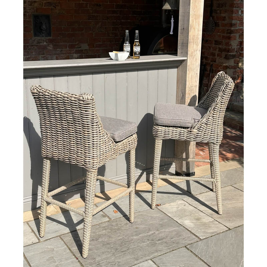 Beige Amalfi outdoor bar stool with powder-coated metal frame, 110cm height, for patio or garden seating by Hill Interiors at brixbailey.com