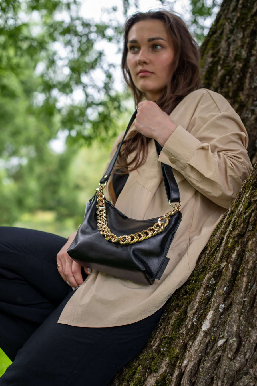 Classic Black Handbag with Metallic Accents – Versatile & Elegant by Zelma Kraft at brixbailey.com