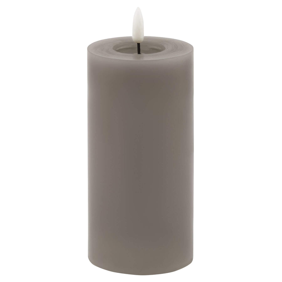 Grey LED wax candle with realistic dripping effect and warm glow, perfect for modern or rustic decor by Hill Interiors at brixbailey.com