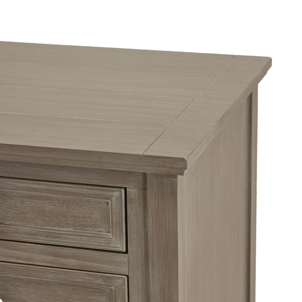 Distressed grey wooden bedside table with three drawers for bedroom storage by Sostter at brixbailey.com