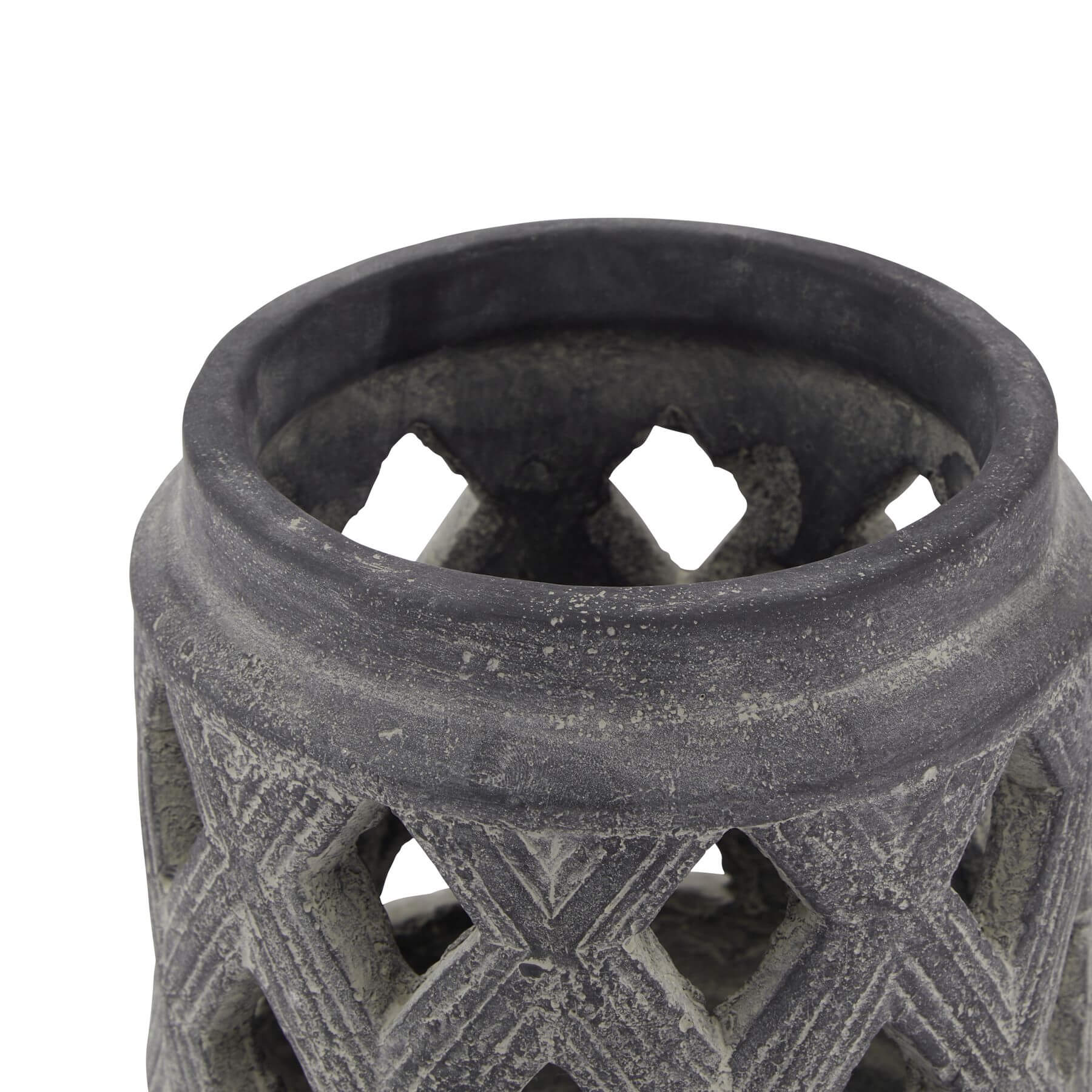 Grey ceramic lattice lantern with geometric Mediterranean patterns, casting intricate shadow art when lit. by Sostter at brixbailey.com