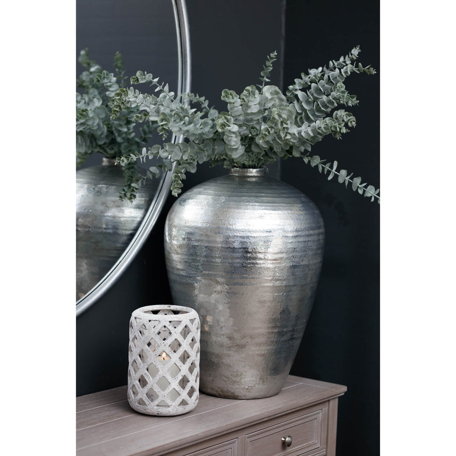 Hand-hammered silver ceramic vase with reflective metallic finish, modern home decor statement piece by Sostter at brixbailey.com