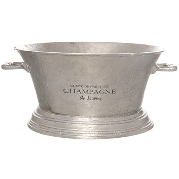 Antique silver champagne cooler with elegant detailing, handcrafted from premium metal, keeps drinks chilled in style. by Sostter at brixbailey.com